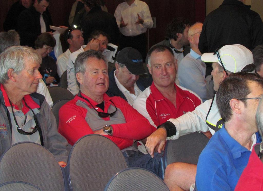 Bruce Taylor, Chutzpah, and Grant Wharington, Wild Thing, discuss the race prior to weather briefing at the 2013 Sydney Gold Coast Yacht Race © CYCA-Staff